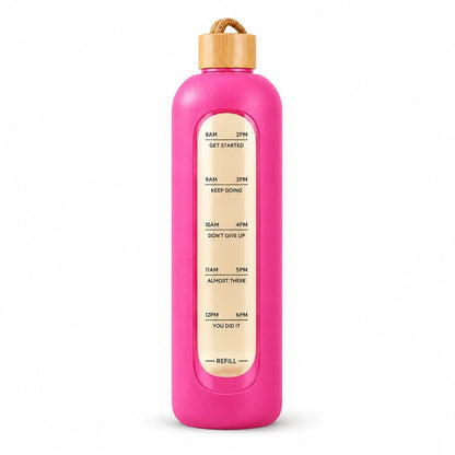 Pink Dropfiltershop borosilicate glass water bottle with bamboo lid and time markings